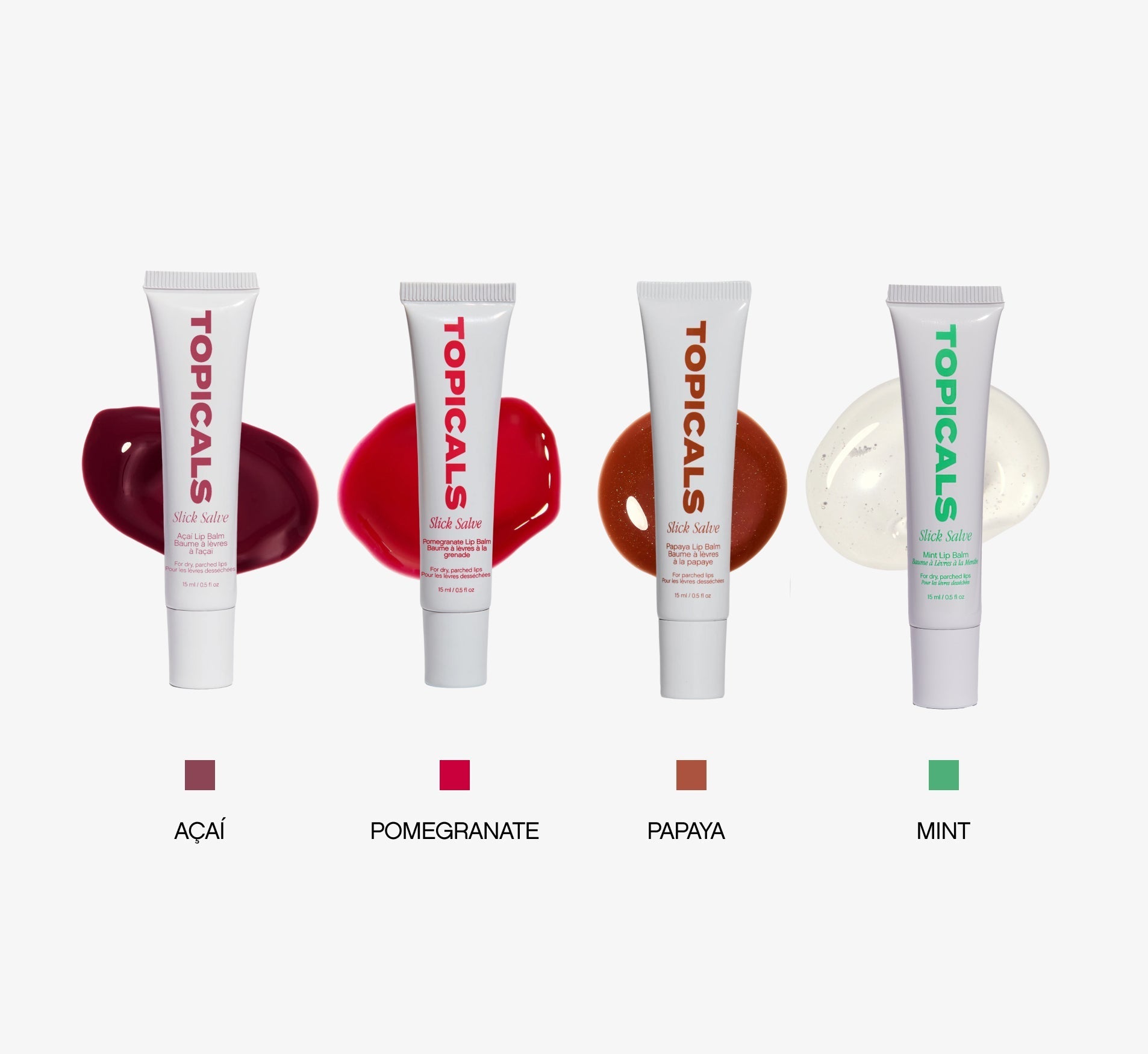 Moisturizing lip balm tubes from Topicals Slick Salve in Açaí, Pomegranate, Papaya, and Mint displayed with color swatches on a white background.